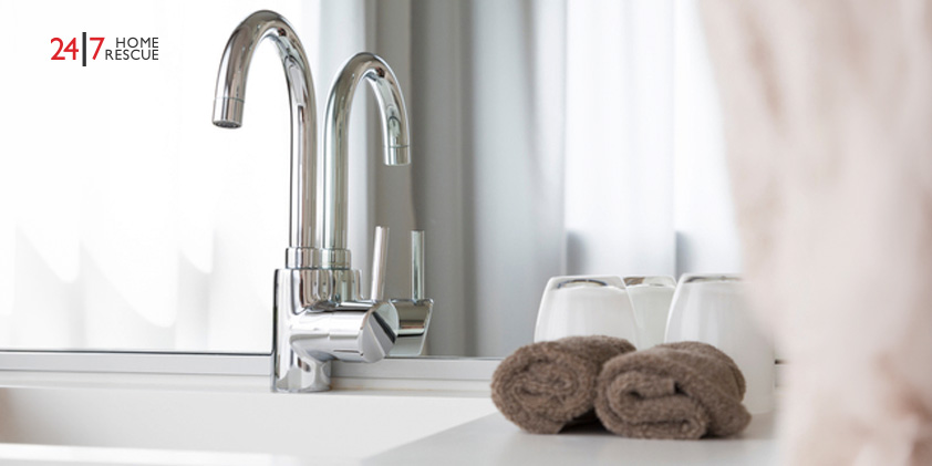 No Water Coming Out of the Tap? Potential Causes and Fixes Water tap in a bathroom with towels