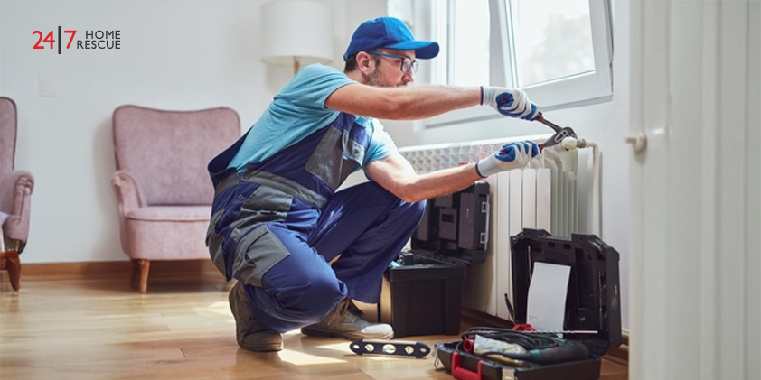 Why Is My Radiator Cold? – Common Faults and How to Fix Them Technician fixing a home radiator during seasonal heating problems