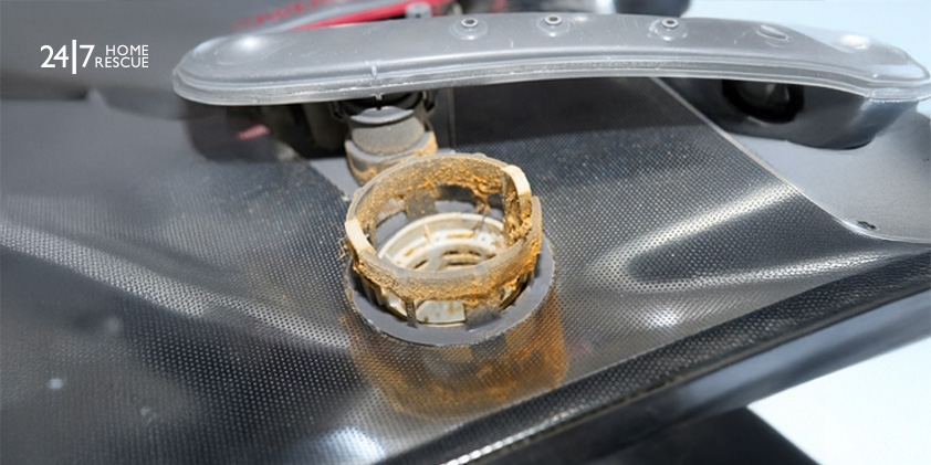 Dishwasher Not Filling with Water? Causes & Fixes Explained A dishwasher filter in the kitchen clogged with food scraps