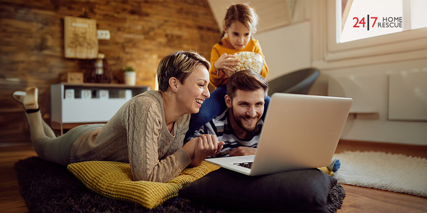 Parents and daughter happy in living room