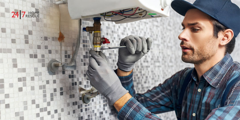 Vaillant F83 Fault Code – Causes & How to Fix It Close-up of a technician's hand using a wrench to repair an boiler.
