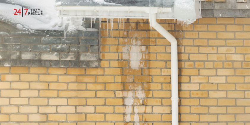 Ideal F2 Fault Code: What Does It Mean & How to Fix It Ice-covered brick wall with frozen downpipe