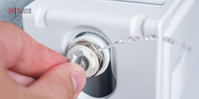 How to Reset Ideal Logic Combi 30 Boiler: A Comprehensive Guide The bleed valve in the radiator to vent air from the radiator. Person's bleeding a radiator to make the heating more efficient.