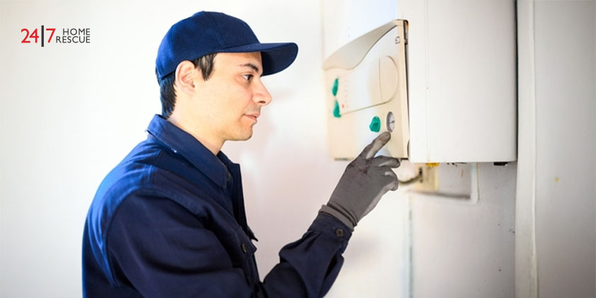 A Comprehensive Guide to Understanding Glow Worm Boiler Pressure: Common Issues and Effective Solutions Smiling engineer repairing an gas boiler