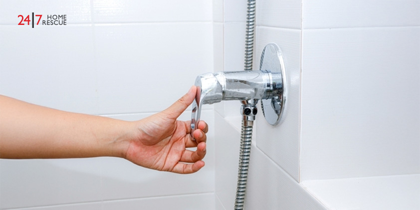 Reasons Why There Is no Hot Water in Your Shower hand grab shower valve handle in bathroom
