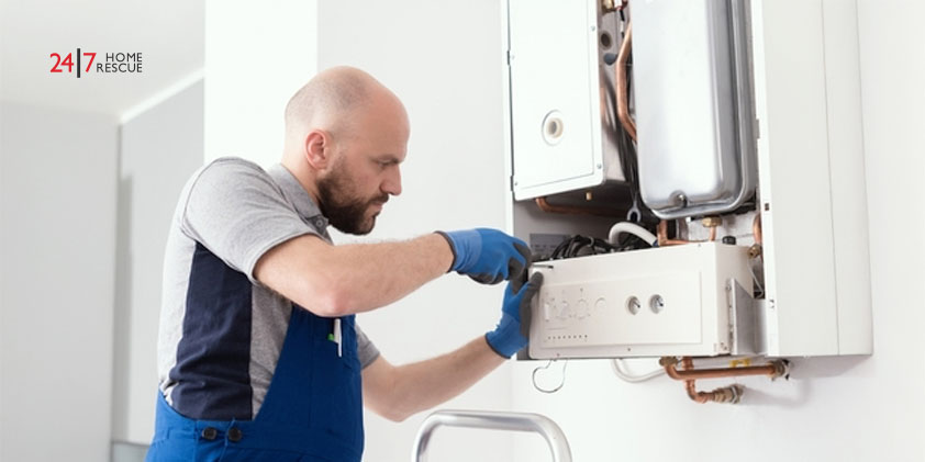 E119 Boiler Error Code: Low Pressure Fault Causes and Fixes An engineer fixing a boiler