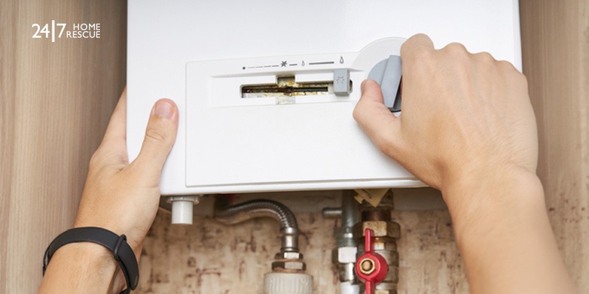 Common Reasons Behind a Vokera Boiler Red Light Warning A person performing a DIY fix on a gas boiler