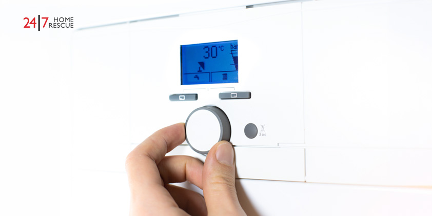 Vaillant Boiler Flashing Radiator Symbol Explained Person adjusting the temperature of a gas boiler