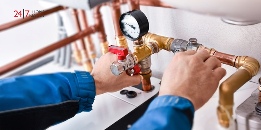Understanding Ideal Boiler Pressure and How to Maintain It A gas safe engineer fixing a boiler