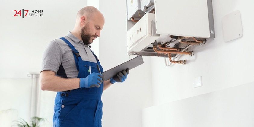 How Often Should a Boiler Be Serviced Professional boiler engineer carrying out an annual gas boiler service and safety inspection