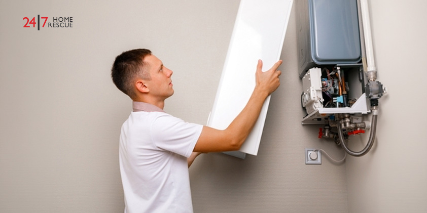How Often Should a Boiler Be Serviced Homeowner opening a boiler cover for inspection before a routine boiler service