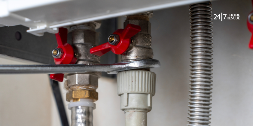 Boiler valves showing open or closed positions underneath a boiler