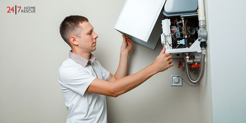 Engineer opening boiler casing